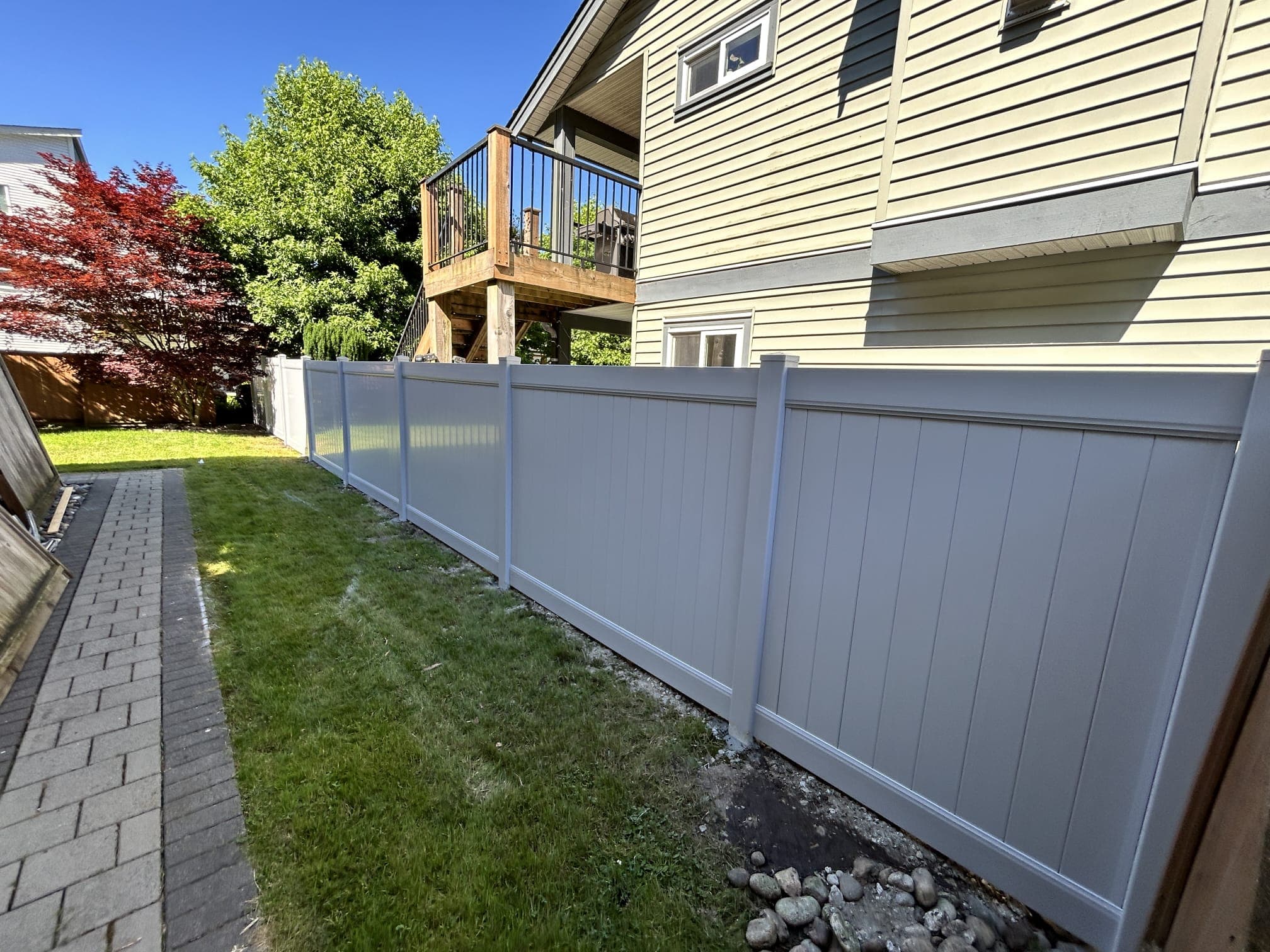 Premium cedar fence installation by H&V Enterprise in a Canadian backyard