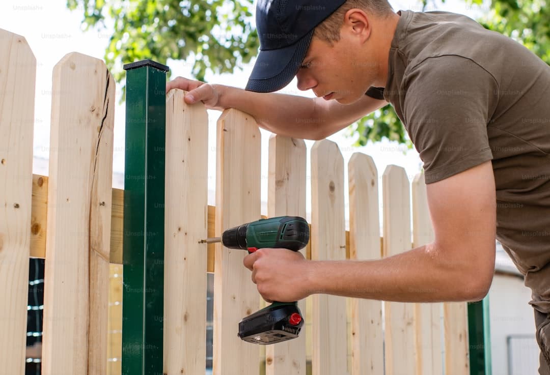 H&V Enterprise crew installing a fence